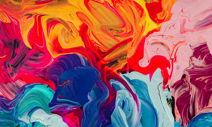 Macro close up of different color oil paint.